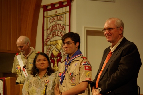Troop 355's newest Eagle Scout, James Lewis, his mother and father, and Troop Committee Chair Frank Milewski